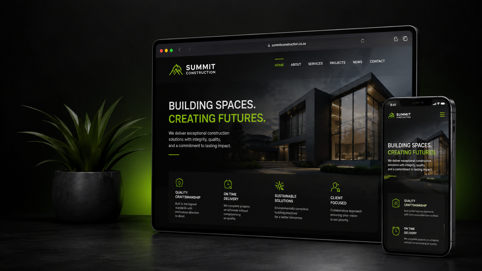 Modern responsive construction website displayed on a tablet and mobile phone in a dark green workspace